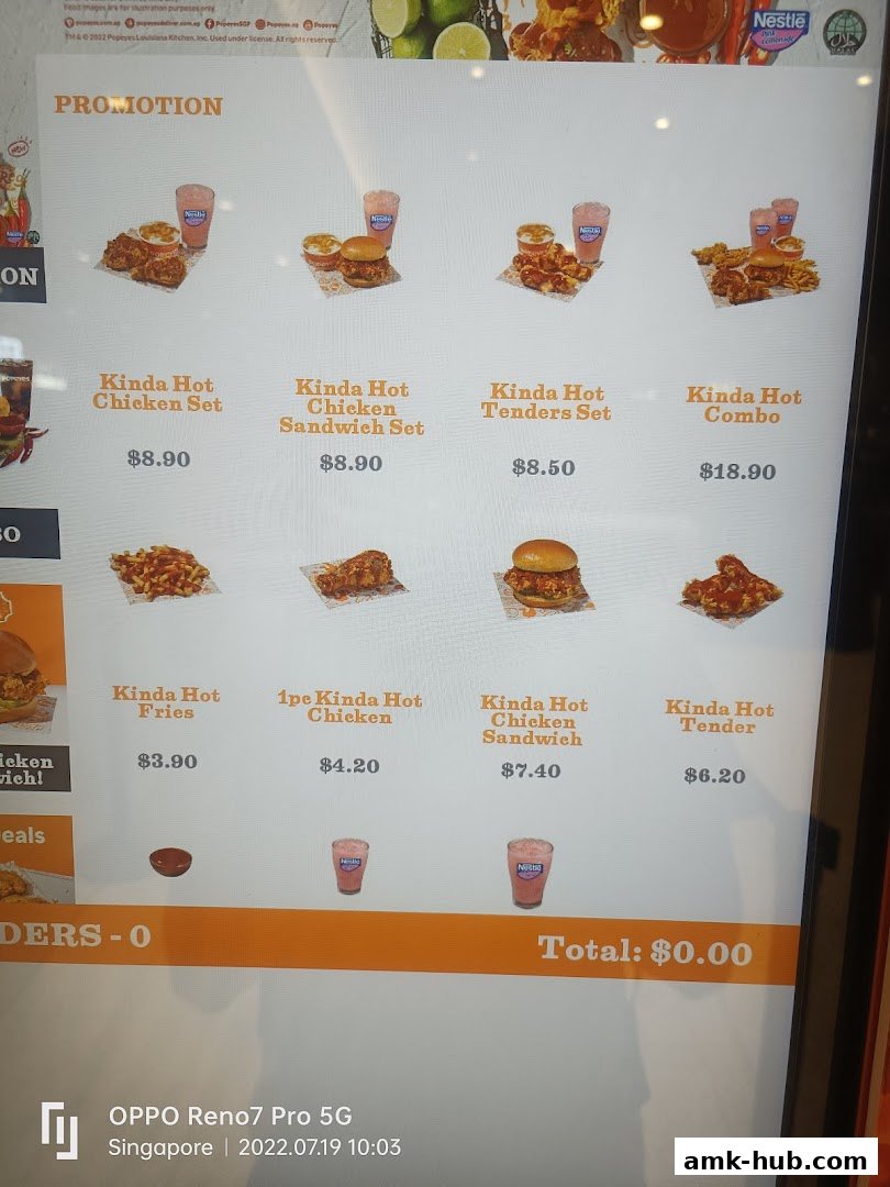 A digital menu board displaying Popeyes' Kinda Hot chicken promotions and meal deals.