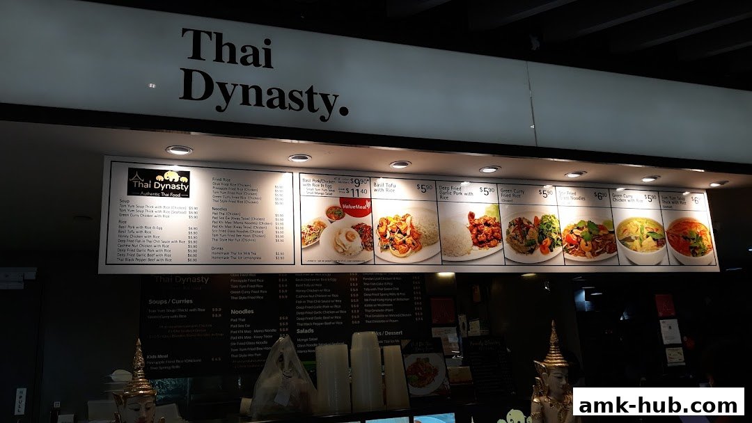 A menu board for Thai Dynasty restaurant displaying various Thai dishes and their prices.