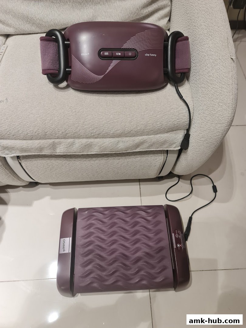 Two purple OSIM massage devices, one a waist belt and the other a foot massager, are displayed.