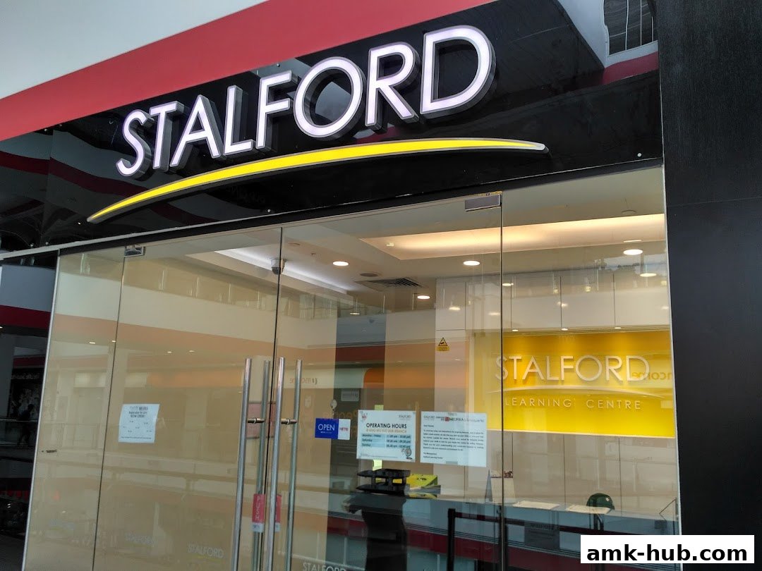 The entrance of Stalford Learning Centre at AMK Hub, featuring a prominent sign and glass doors.