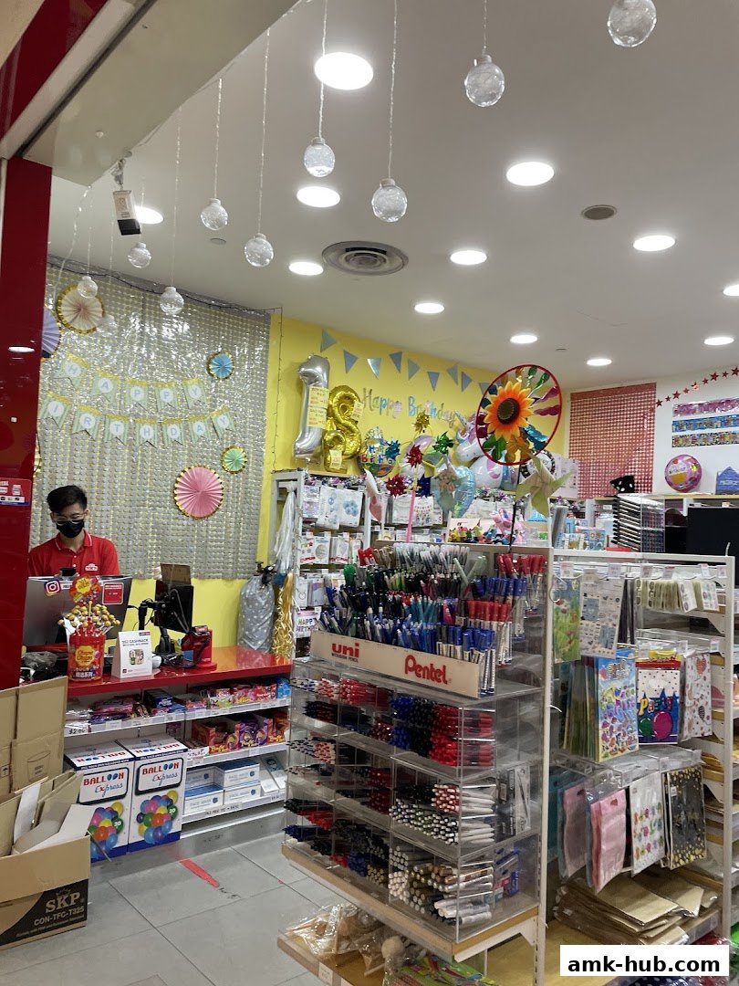 A well-stocked stationery and party supplies store with pens, balloons, and birthday decorations.