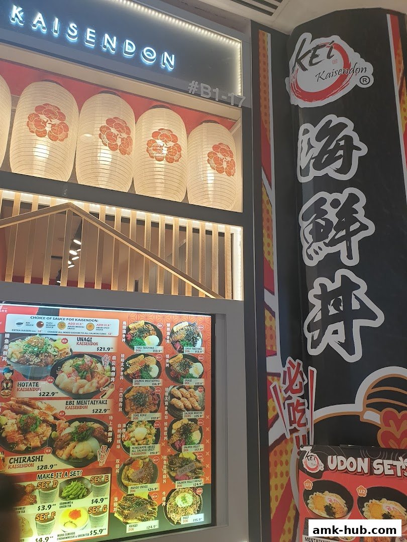 Exterior view of Kei Kaisendon AMK HUB, showcasing its signage and a vibrant menu display.