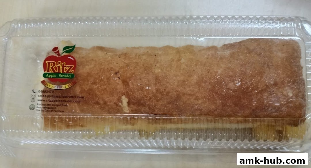 A packaged Ritz Apple Strudel in a clear plastic container.