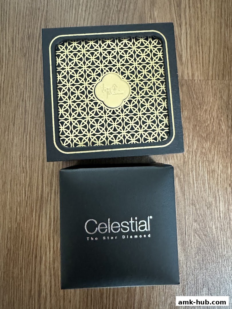 Two elegant jewelry boxes, one with intricate gold patterns and the other branded 'Celestial'.