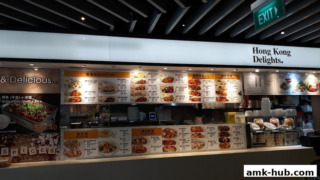 A food stall counter displaying various Hong Kong-style dishes and set meals with prices.