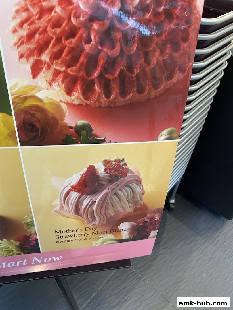 A display featuring a Mother's Day Strawberry Mont Blanc cake and other floral desserts.