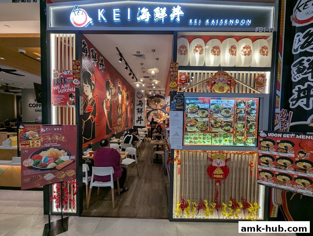 The entrance of Kei Kaisendon AMK HUB, showcasing its menu and vibrant decor.