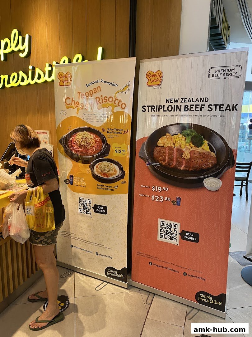 Two promotional banners for Pepper Lunch featuring a risotto and a beef steak.