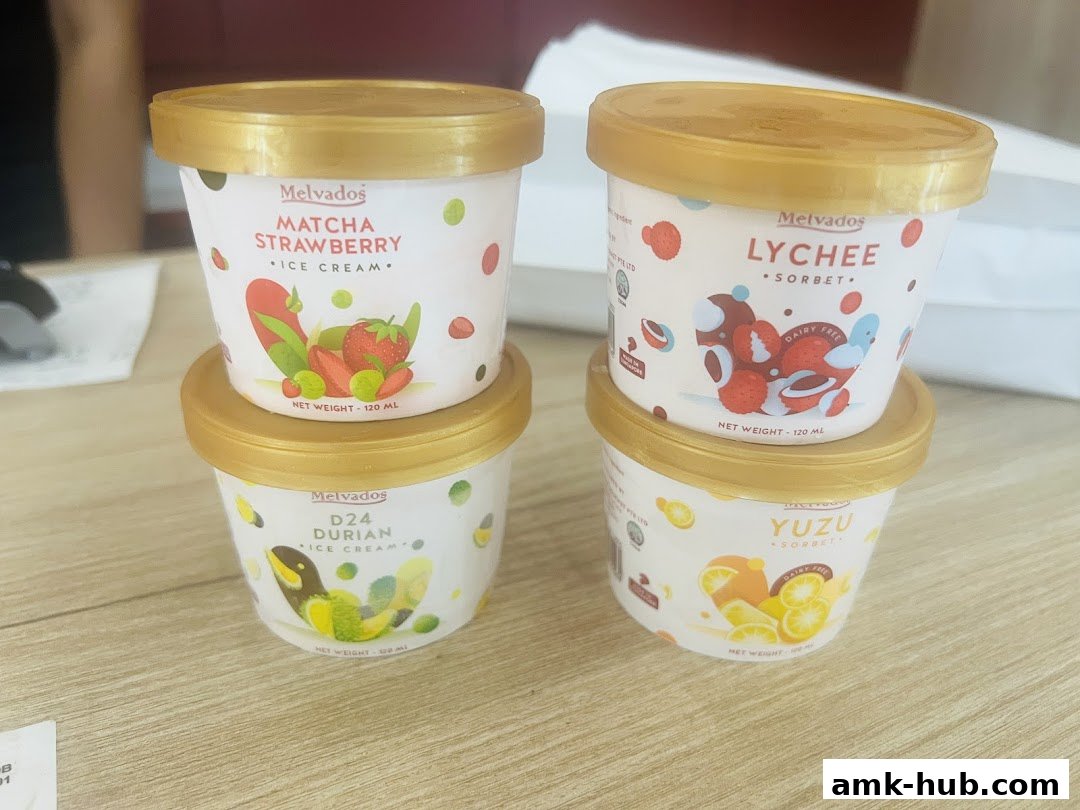 Four tubs of Melvados ice cream and sorbet in various flavors.