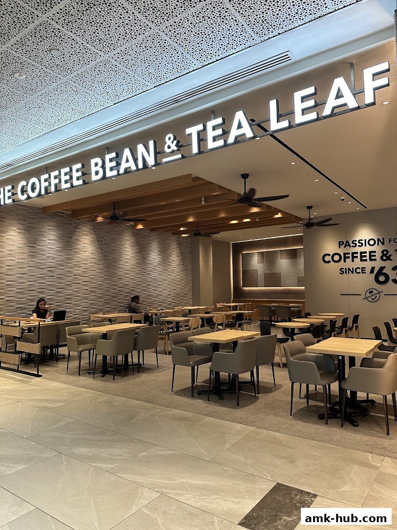 Interior view of The Coffee Bean & Tea Leaf with seating and the shop's signage.