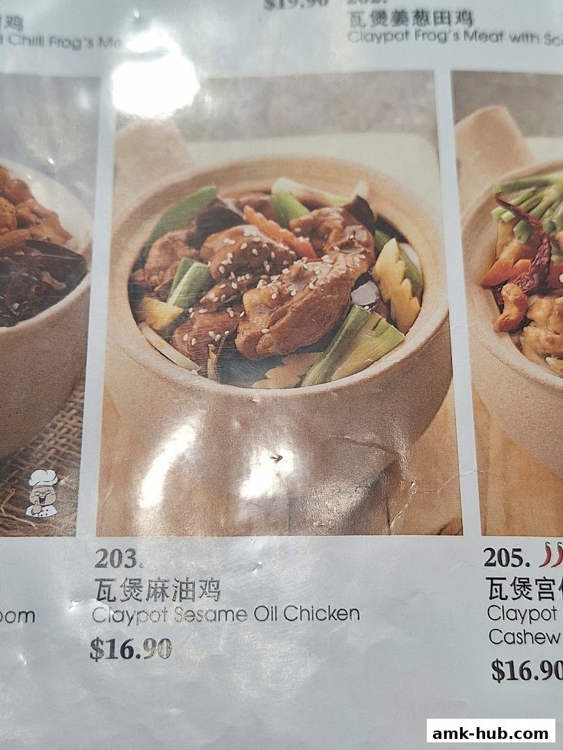 A menu featuring claypot dishes, including sesame oil chicken and cashew chicken.