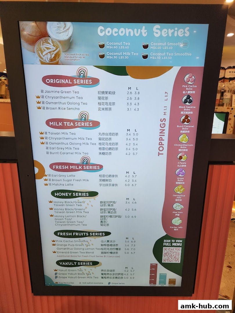 A menu board displaying various coconut-themed drinks and toppings with prices.
