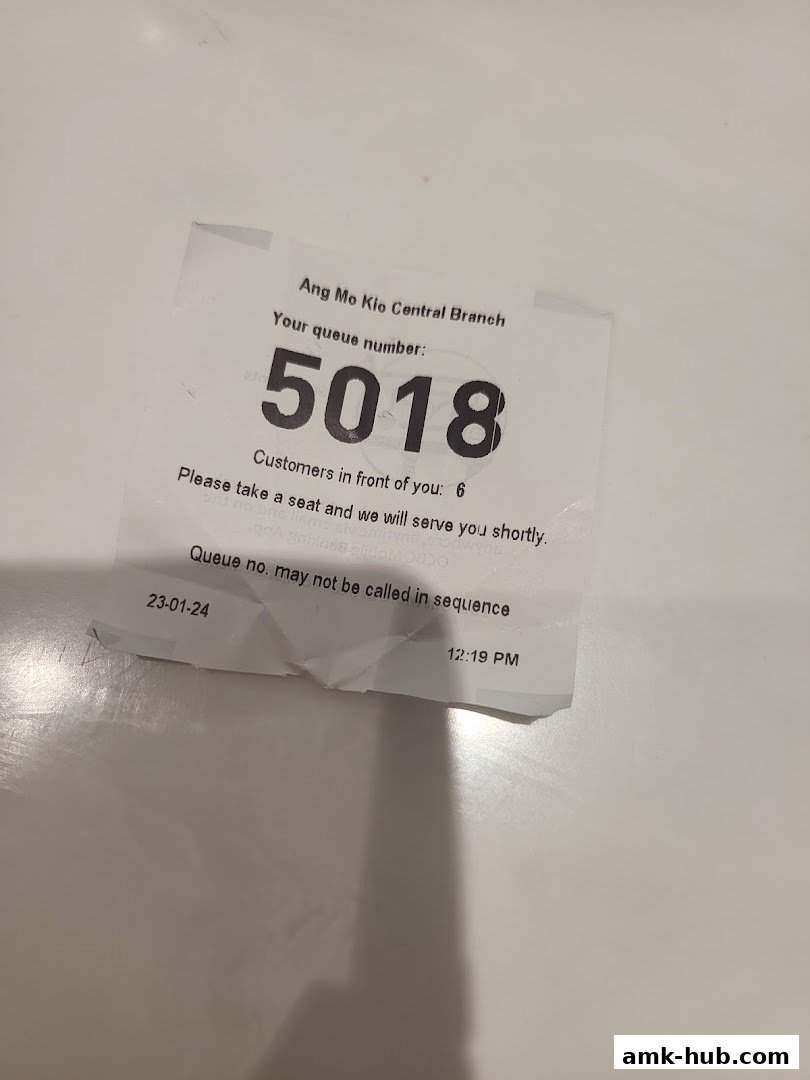 A queue ticket from OCBC Bank Ang Mo Kio Central Branch.