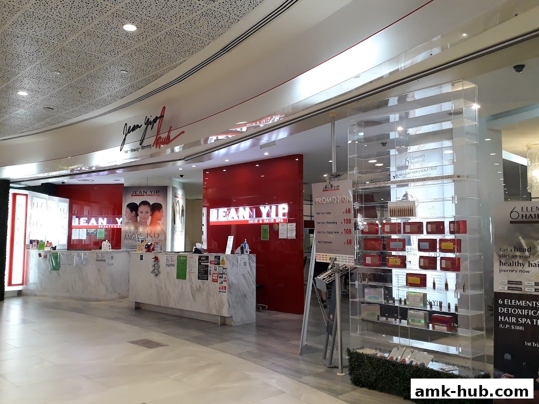 The Jean Yip Beauty shop front with promotional displays and product shelves.