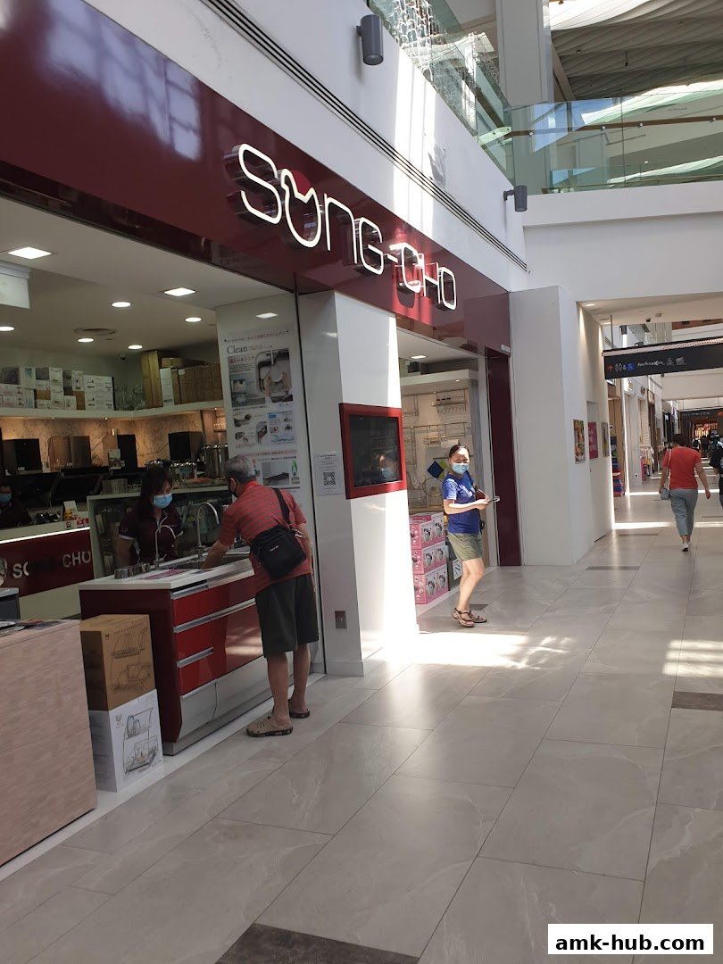 The exterior of the Song-Cho shop with its prominent signage and display.