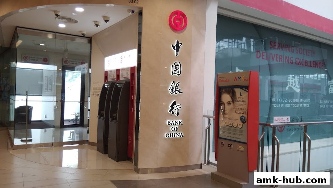 The Bank of China Ang Mo Kio Sub-Branch entrance with ATMs and promotional displays.