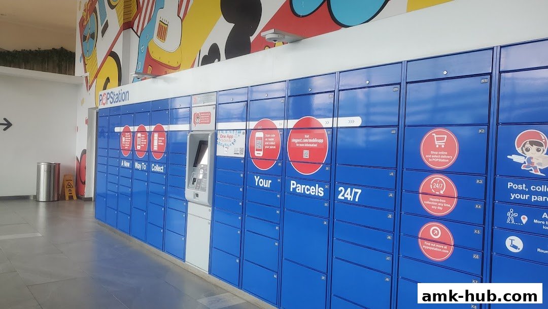 POPStation parcel lockers with colorful wall art and a payment kiosk.