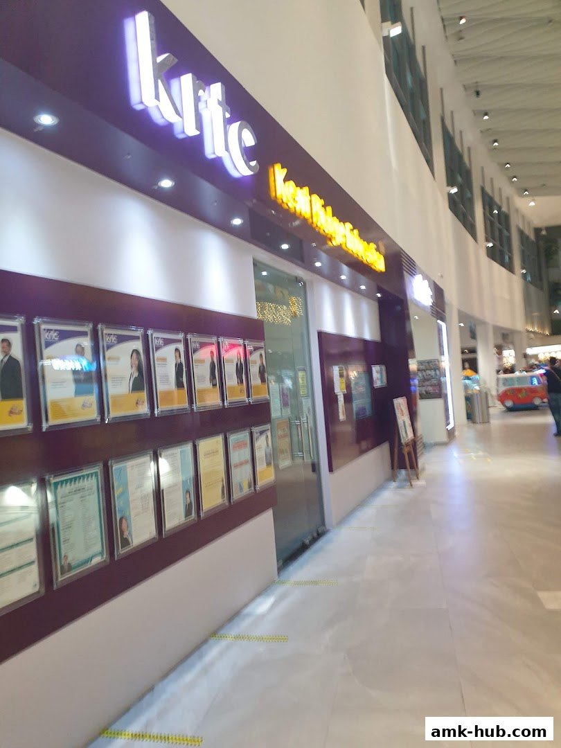 The exterior of the KRTC Ang Mo Kio shop with framed certificates displayed on the wall.