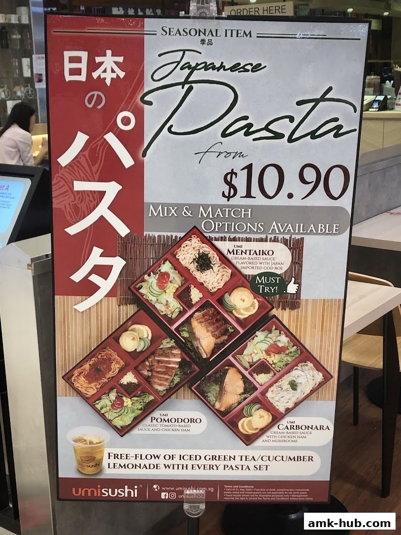 A sign advertising Japanese pasta sets with mix and match options and free flow drinks.