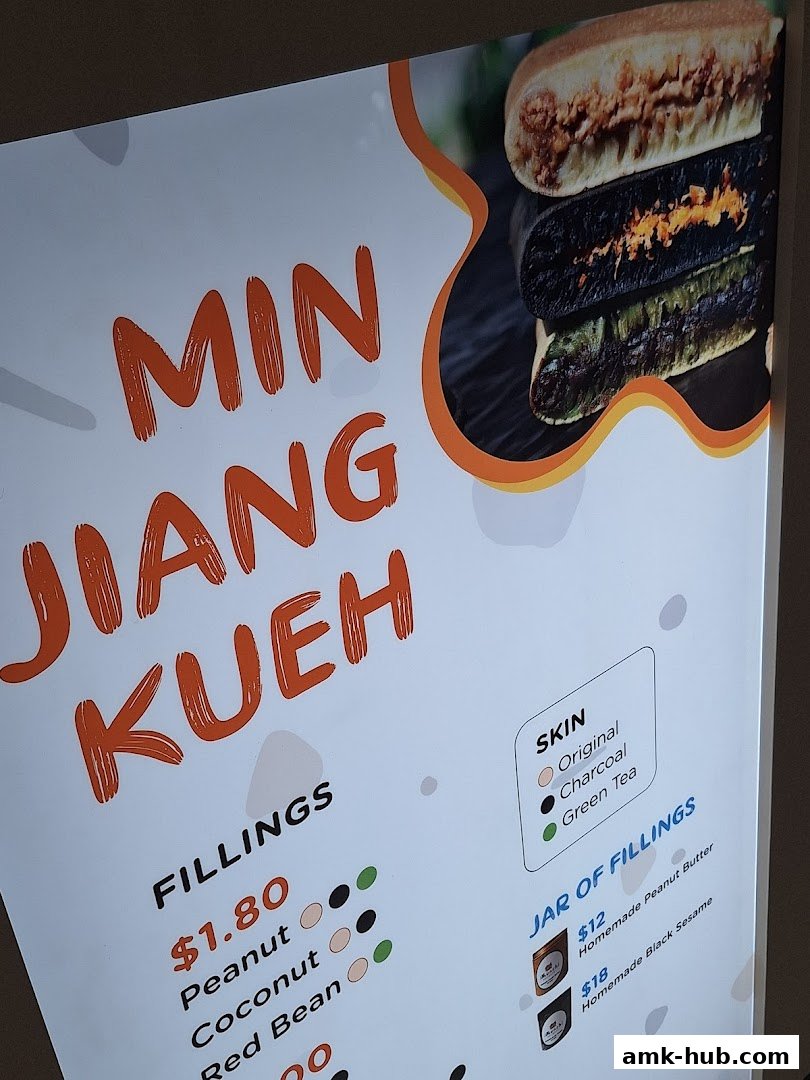 A menu board for Munchi Pancakes, showcasing fillings and skin options.