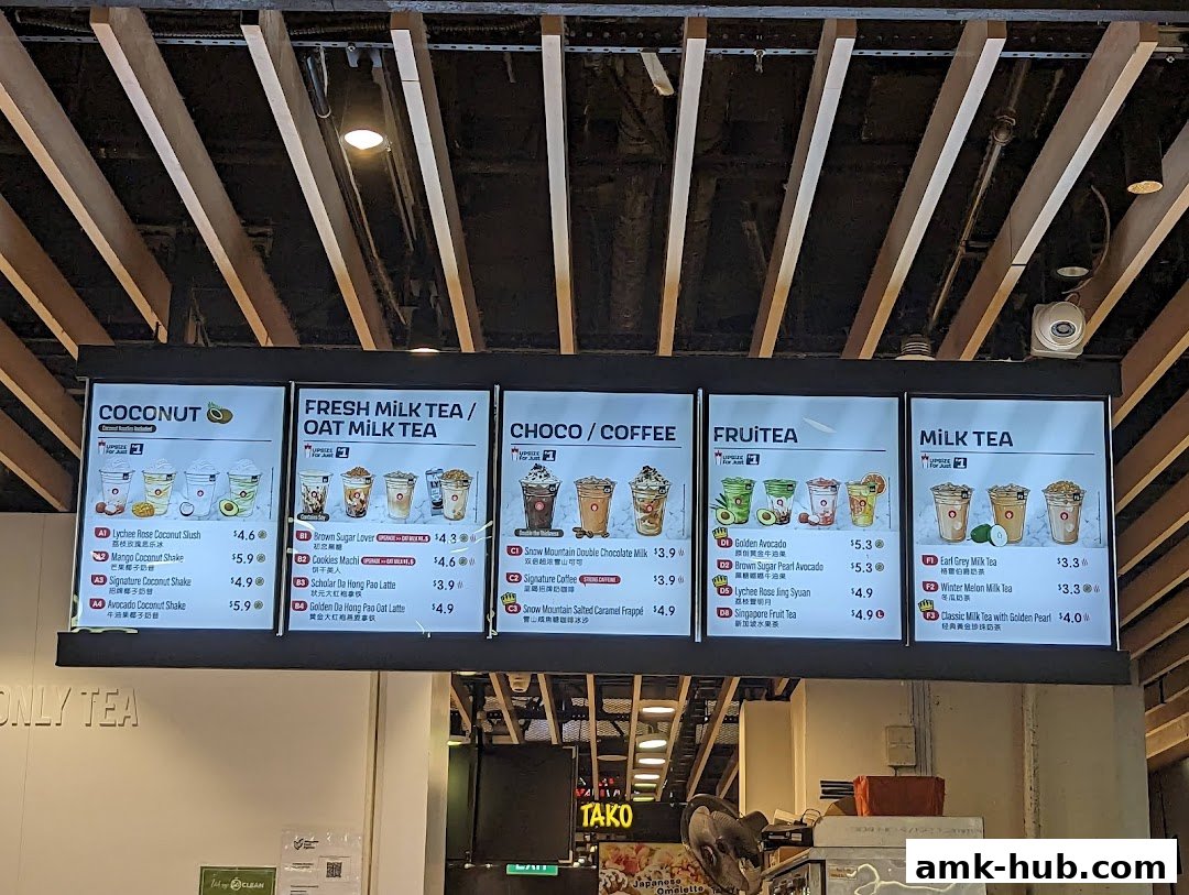 A digital menu board displaying various milk tea and fruit tea options from LiHO TEA.