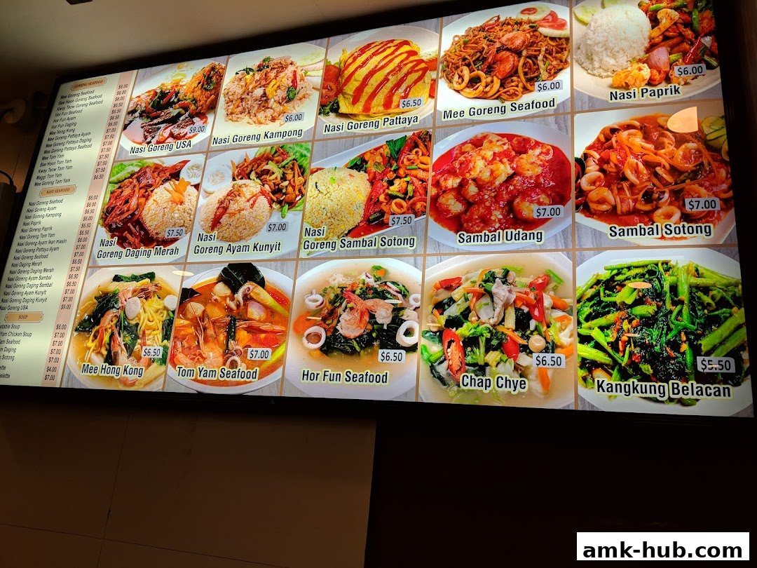 A brightly lit menu board displaying various Asian dishes with appetizing photos and prices.