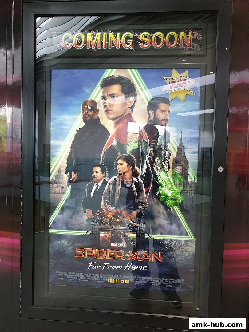 A movie poster for "Spider-Man: Far From Home" displayed in a cinema.