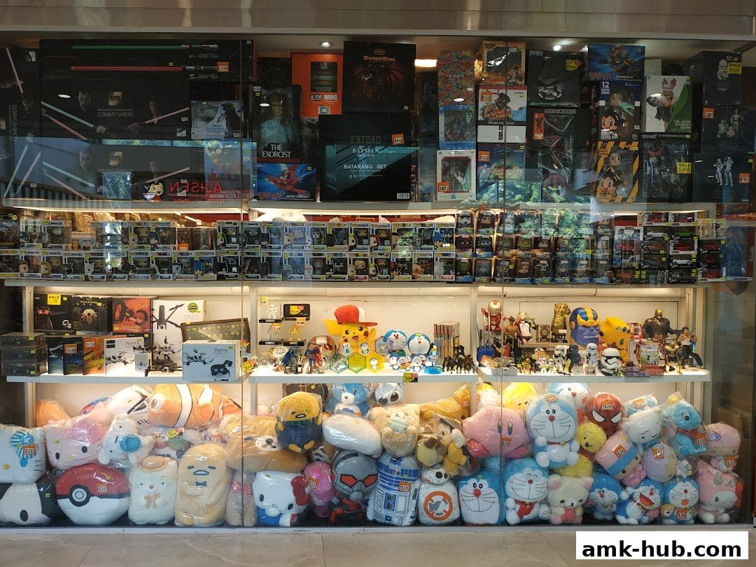 A shop window display filled with various toys, collectibles, and plushies.