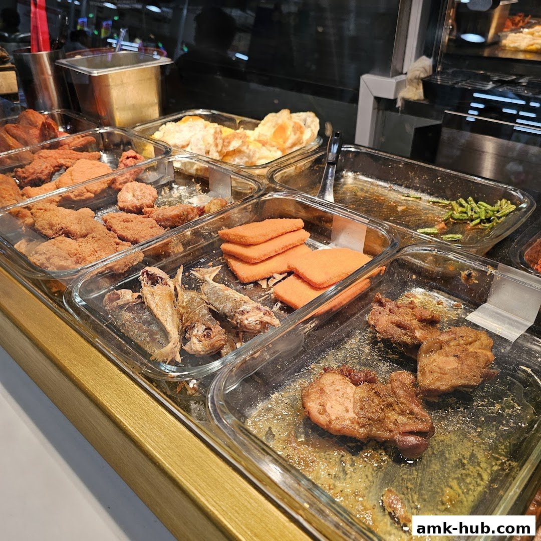 A variety of delicious food items displayed in glass trays, ready to be served.