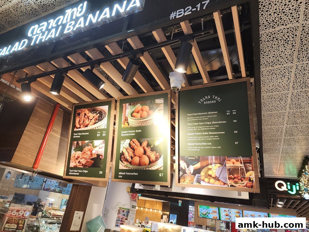 A menu board for Talad Thai Banana featuring fried banana and yam dishes.