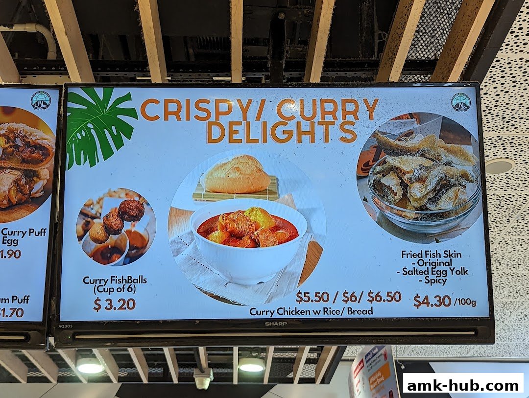 A digital menu board displaying various crispy and curry delights with images and prices.