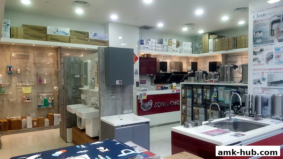 Interior view of a home goods store showcasing bathroom fixtures and kitchen appliances.