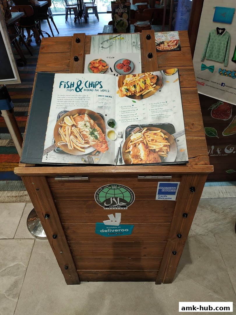 A menu featuring fish and chips from around the world, with various options and prices.