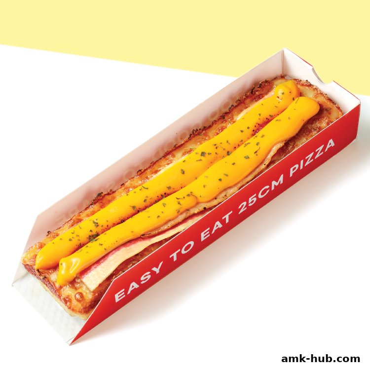 A long, thin pizza with melted cheese and herbs in a red cardboard box.