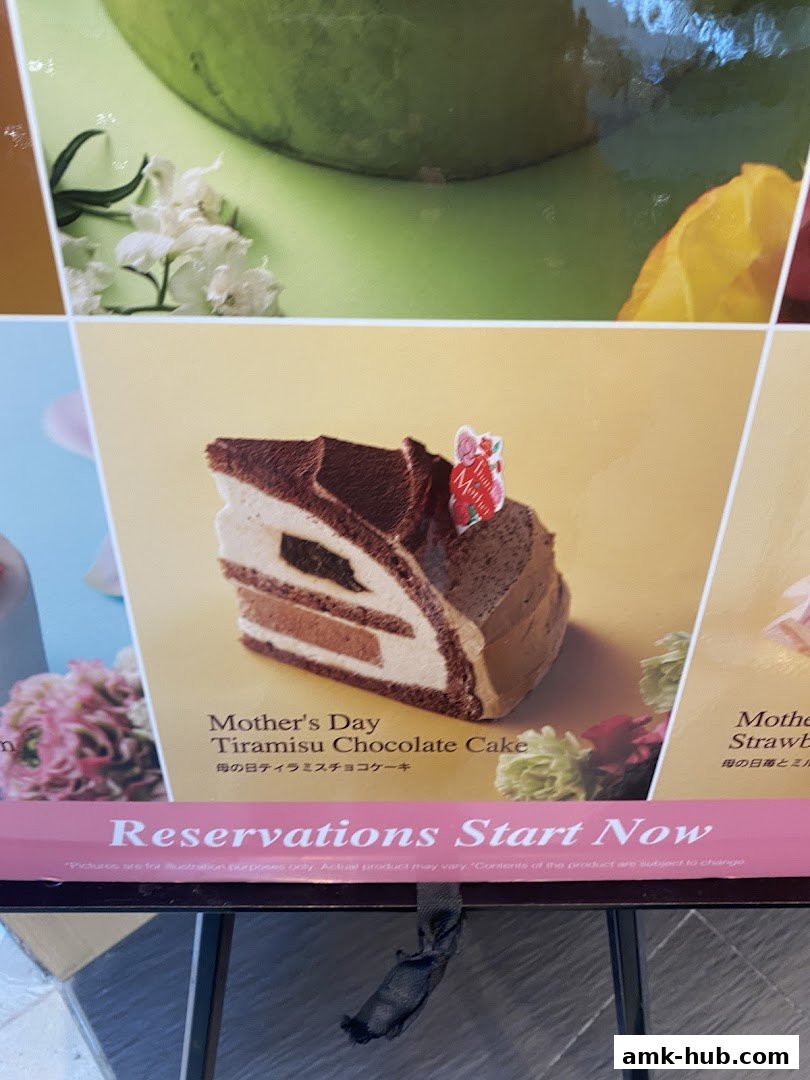 A slice of Mother's Day Tiramisu Chocolate Cake with decorative flowers.