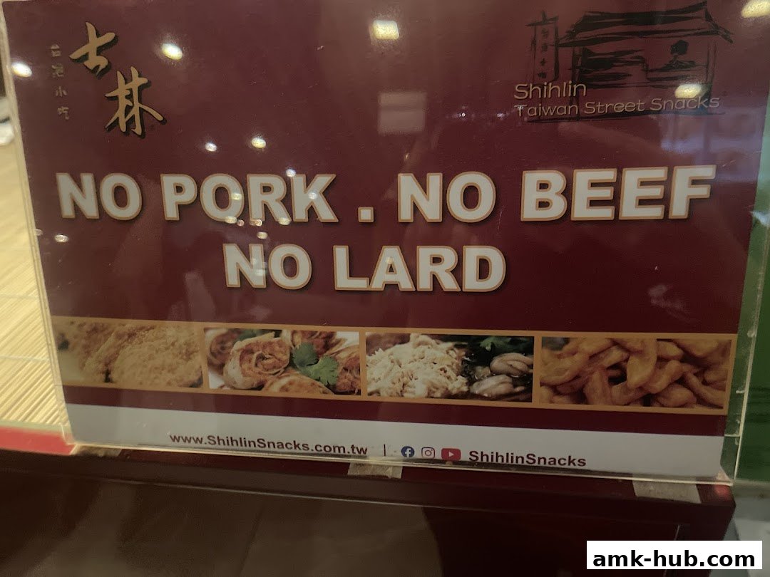 A sign for Shihlin Taiwan Street Snacks stating 'No Pork, No Beef, No Lard'.