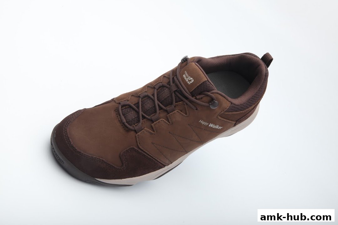 A brown Happy Walker shoe with laces on a white background.