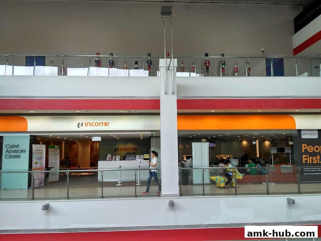 The Income Insurance Ang Mo Kio Branch shop front with a client advisory centre and interior seating.