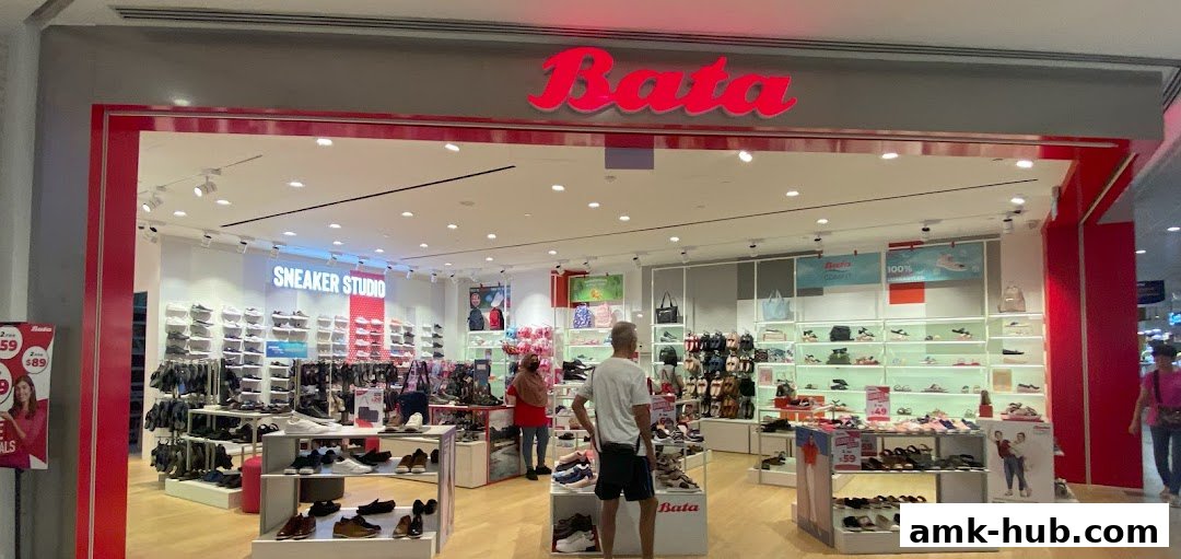 The Bata shoe store features a wide selection of footwear displayed on shelves and racks, with a prominent 'Sneaker Studio' section.