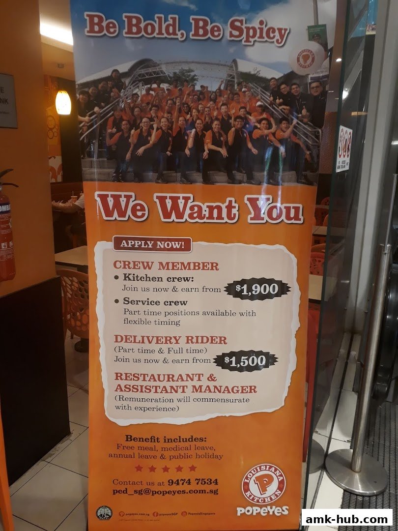 A recruitment banner for Popeyes offering various job positions and benefits.