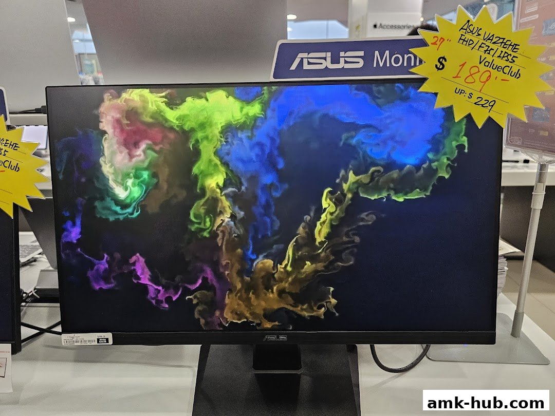 A computer monitor displaying colorful abstract smoke patterns with a price tag.