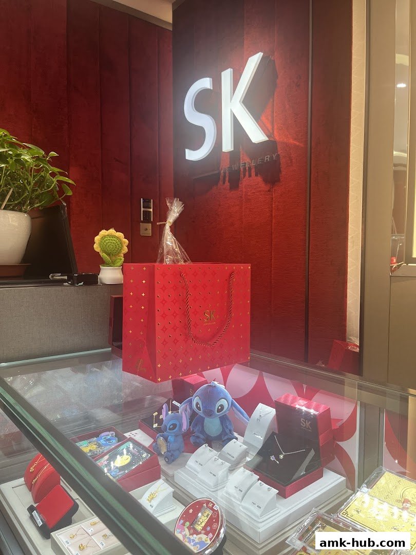 SK Jewellery store interior with display cases filled with jewelry and plush toys.
