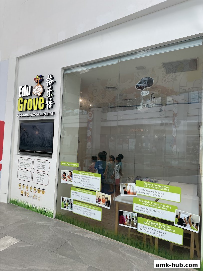 The storefront of EduGrove Mandarin Enrichment Centre, showcasing its programs and logo.