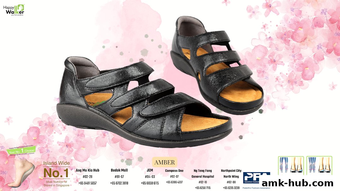 A pair of black Happy Walker sandals displayed with floral accents and store information.