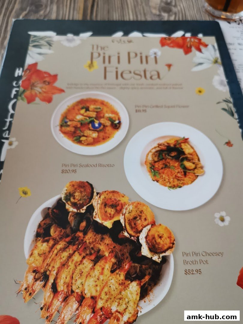 A menu featuring 'The Piri Piri Fiesta' with seafood dishes and prices.