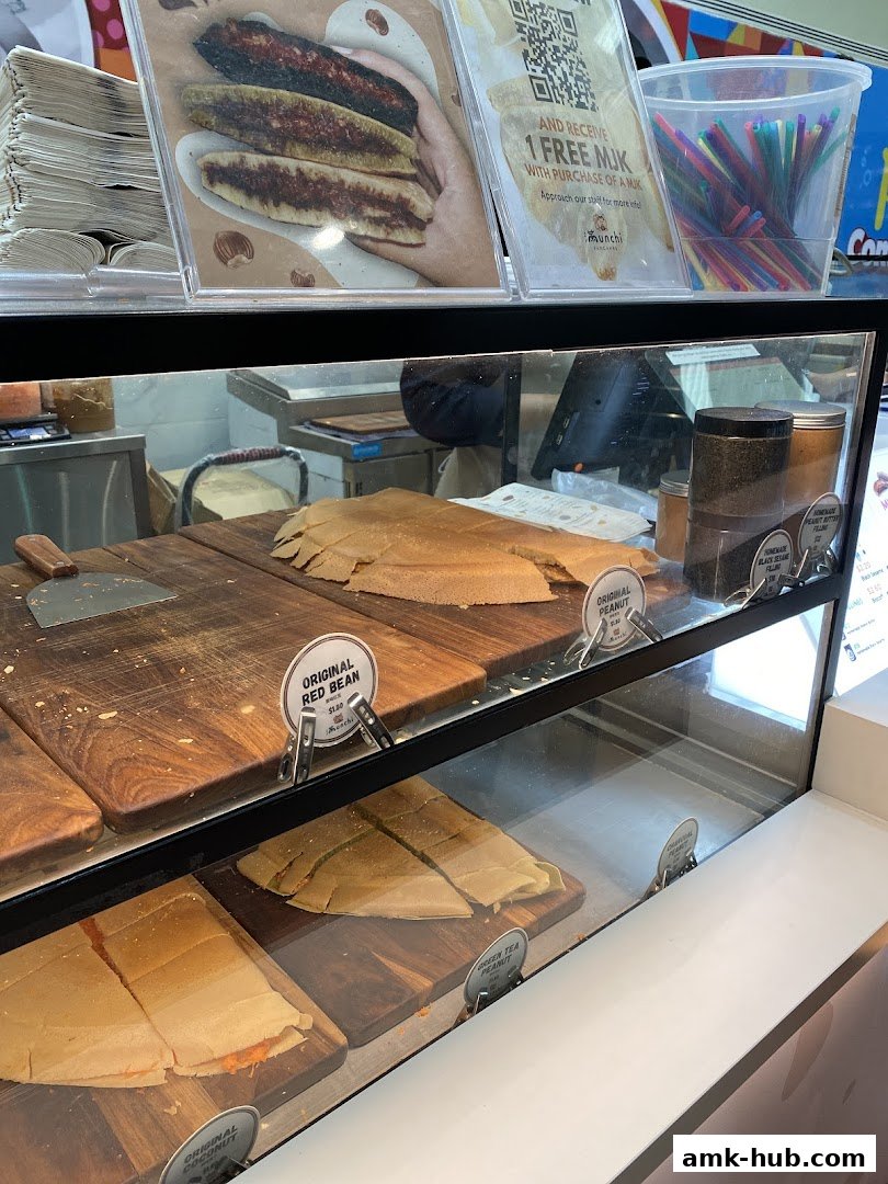 Display case filled with various flavors of pancakes at Munchi Pancakes.