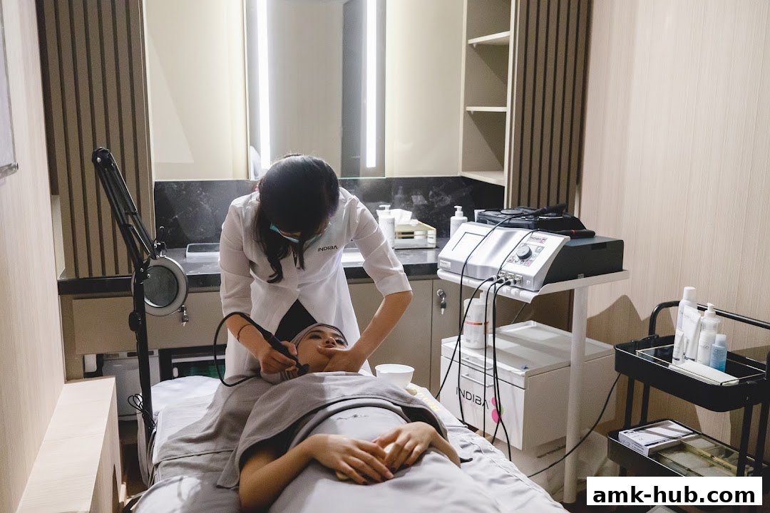 A beautician performs a facial treatment on a client with specialized equipment.