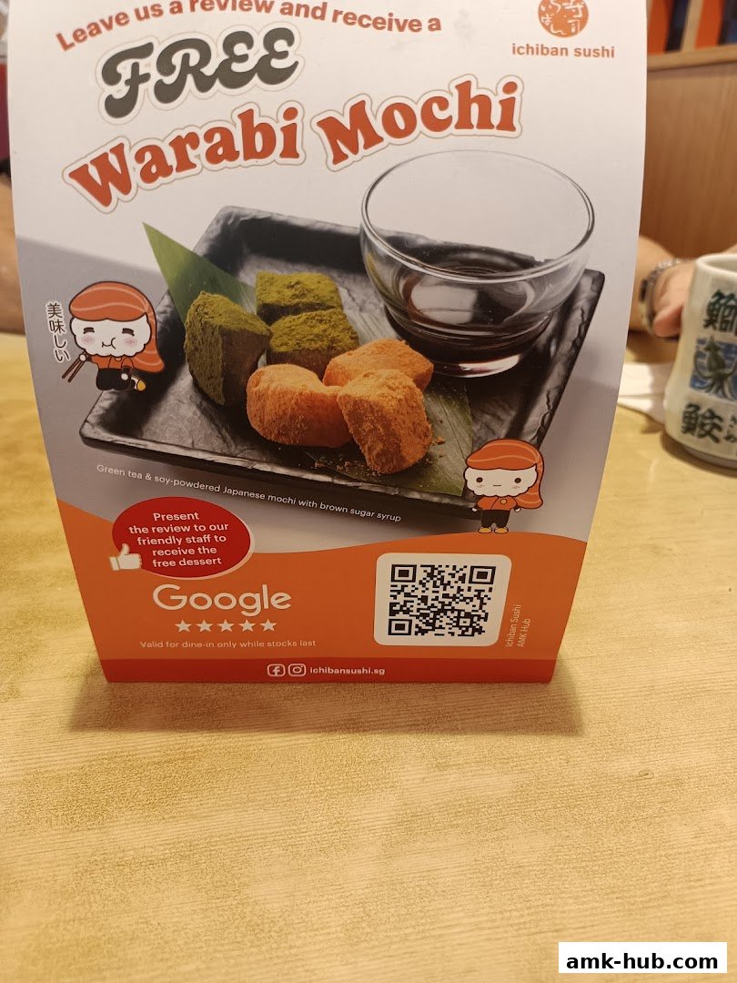 A promotional flyer for Ichiban Sushi offering free Warabi Mochi with a review.