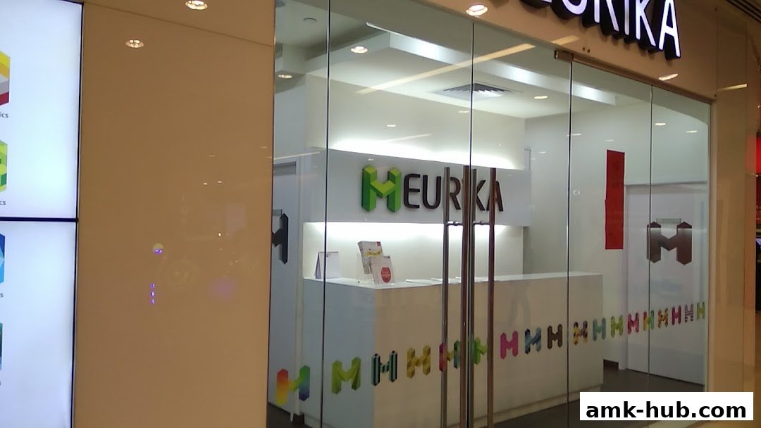 The entrance to Heurika Institute of Mathematics, a modern educational center with a clean white reception area.