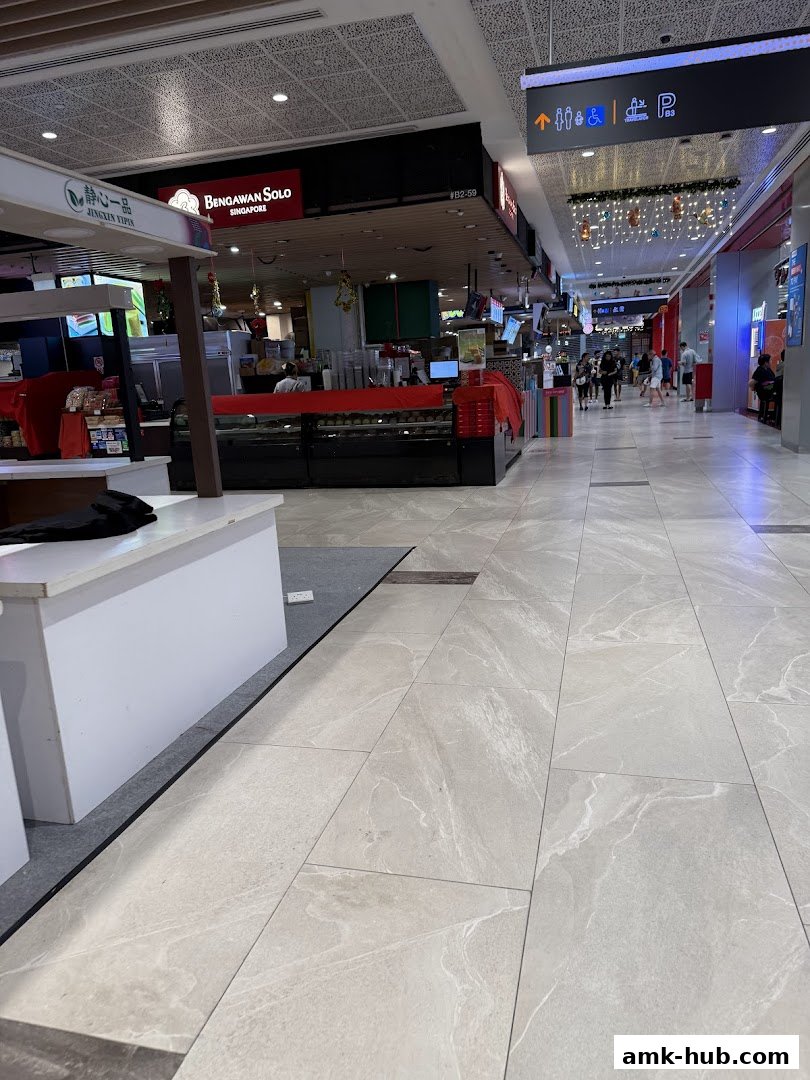 The exterior of the Bengawan Solo shop in a mall, showcasing its food display and signage.